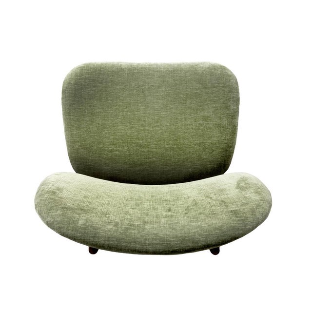 The chairs were inspired by Alf Svensson's Teve chairs, but were produced in Rome by Pizzatti. This piece is attributed to...