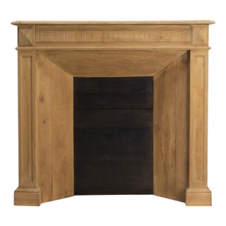 Antique French Fireplace Mantel in Molded Oak, 1890 For Sale