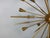 Italian design chandelier "Sputnik" with 32 arms and 24 lights, entirely in brass, dating back to the 1970s. Up to 250V...