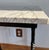 Elegant, one of a kind, artisan vintage wrought iron marble-top side or occasional table featuring a thick white marble...
