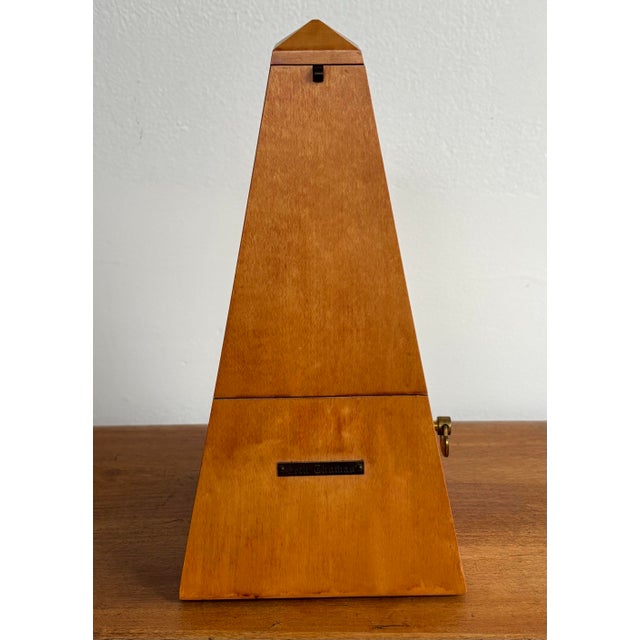 This Seth Thomas Metronome De Maelzel was manufactured by the General Time Corporation, which was founded from the 1930s...