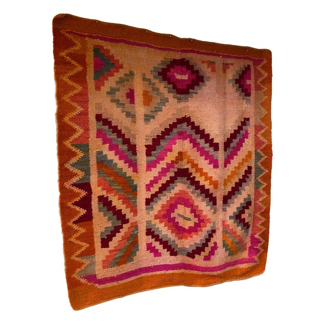 This large-scale mid-20th century Peruvian textile features a bold geometric composition rooted in traditional Andean...