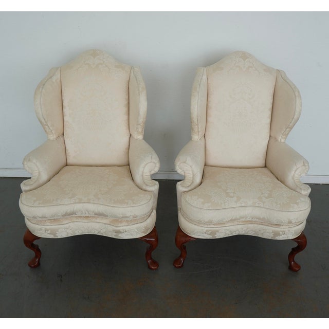 These vintage Fairfield white wingback chairs, crafted in the classic Queen Anne style and dating to the late 20th...