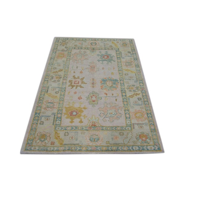Turkish Oushak Rug Cream, Green & Orange Floral Design Handwoven Wool Rug 4' X 5'11" Elevate your decor with the Cream,...