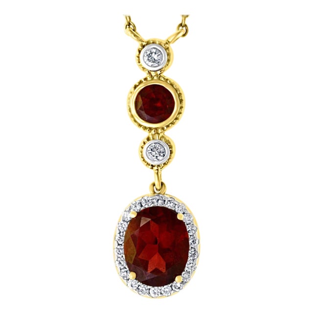 6 Carat Oval Shape Garnet and 0.6 Carat Diamond Necklace in 14 Karat Yellow Gold For Sale