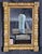 Authentic 19th-century American Federal wall mirror featuring a beautifully carved and gilded wood frame with classic...