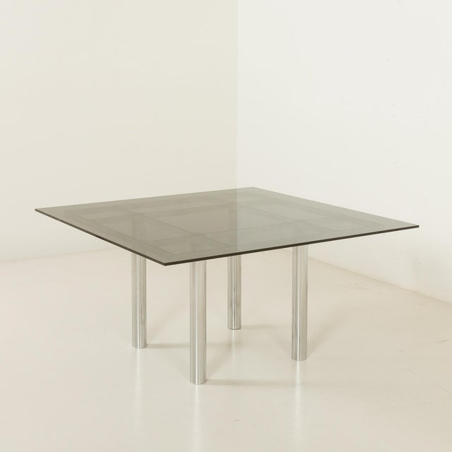 The elegant and highly recognizable "Andre" dining table was designed by Afra and Tobia Scarpa and manufactured by Knoll...