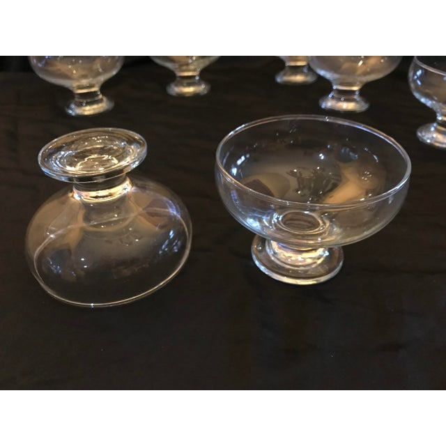 These are antique dessert glasses from the mid 19th century. Footed dessert cups 3 and a quarter inches tall. The rim is 4...