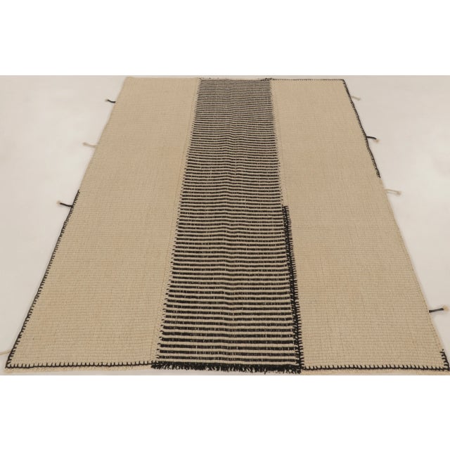 Handwoven in wool, this 7x5 contemporary kilim is a sophisticated addition to Rug & Kilim’s curation. This brand-new piece...