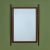 Rectangular walnut wall mirror, accented by walnut dowels along its vertical edges, all secured with brass hardware....