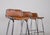 Selection in the style of charlotte perriand (1903-1999). Set of three low-back bar stools, cognac leather riveted to a...