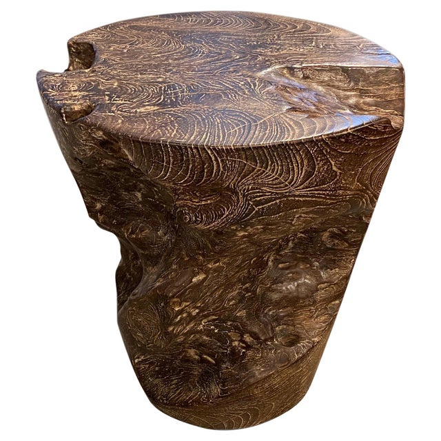 Reclaimed teak side table hand carved from a single teak root with a graduation from the bottom to the top. Charred one...