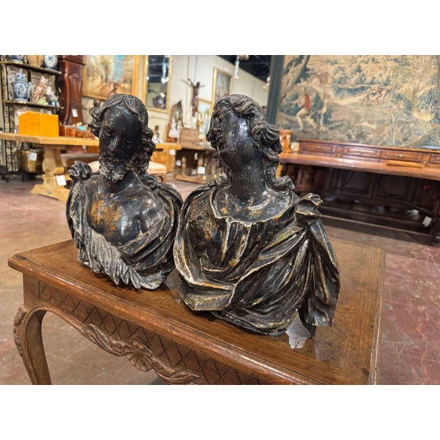Decorate a wall with this striking pair of antique carved bust fragments. Crafted in France circa 1750, the high-relief...