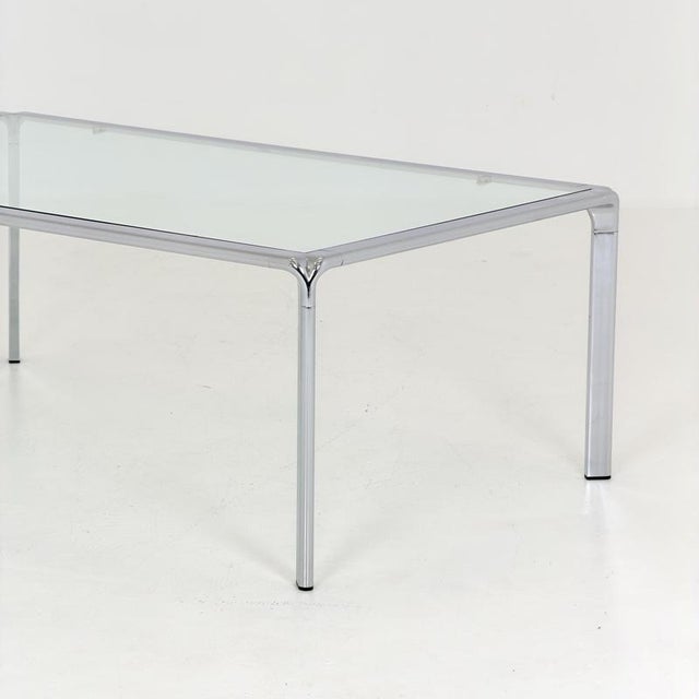 Exceptional 1980s Italian coffee table with a minimalist Bauhaus-inspired design and strong architectural character. The...