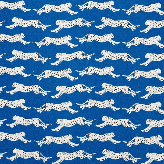Sleek, spotted leopards form dynamic, diagonal stripes in this wildly chic pattern. It's a lively, figurative print that...