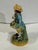 Mid 19th Century Vintage Staffordshire Fruit Seller figurine. It has hand painted details. The colors are vibrant and...
