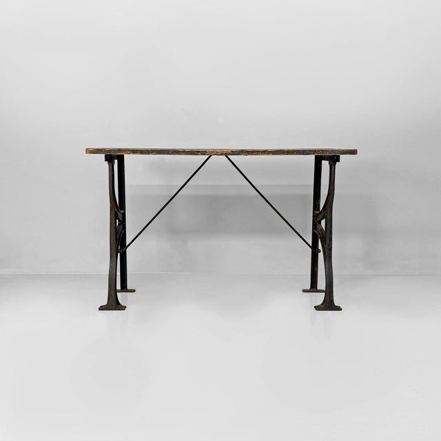Italian industrial wooden and cast iron console, 1800s Industrial-style console table with a rectangular solid wood top...