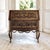 A 19th century Country French Louis XVI secretary carved from solid old growth oak, its warm, mellow patina glowing across...