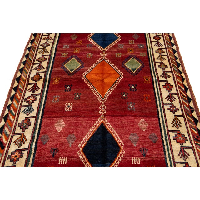 Red 4 X 7 Room Size Persian Shiraz Wool Rug in Red With Tribal Motif For Sale - Image 8 of 8