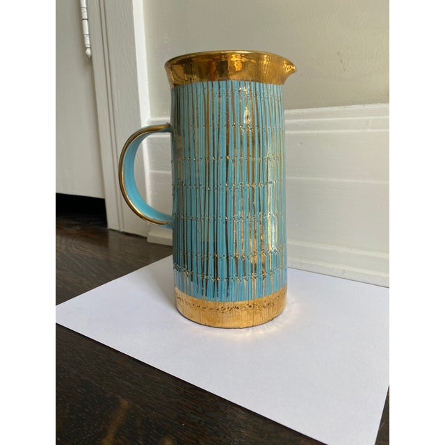 Gorgeous turquoise and gold Mid Century Modern Italian pitcher/vase. it very rare and very pretty.