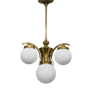 1930s Czechoslovak Art Deco Brass Chandelier with Four Opaline Glass Globes For Sale