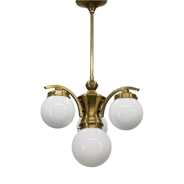 1930s Czechoslovak Art Deco Brass Chandelier with Four Opaline Glass Globes For Sale