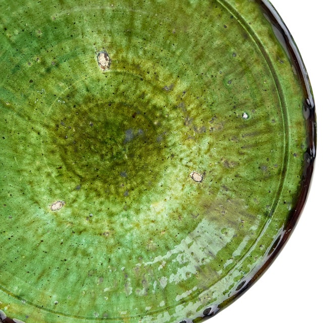 Handcrafted in southern Morocco, Tamegroute pottery is celebrated for its distinctive green glaze, organic forms, and...