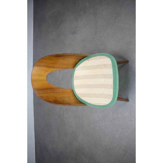 An original Mid-Century Modern chair designed by Antonín Šuman for Tatra Nábytok Pravenec, produced in Czechoslovakia...