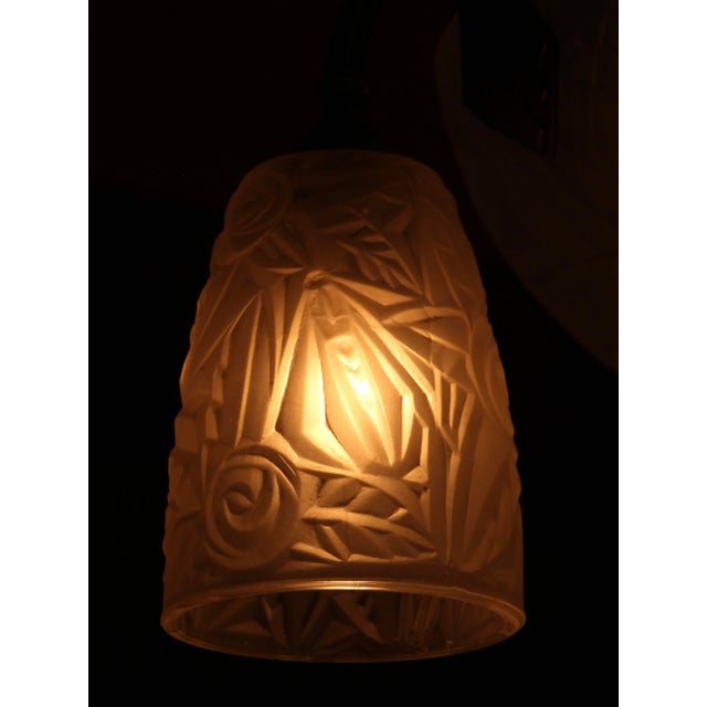 This large pending light with a geometric motive was produced by famous “Noverdy” company in France in the 1920s. Its...
