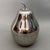 An iconic pear-shaped stainless steel bar ice bucket, attributable to the vibrant pop design of the 1970s. Subject and...