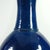 A large table lamp made of ceramic. Decorated with a highly glossy glaze in a saturated blue-navy blue. The lamp comes...
