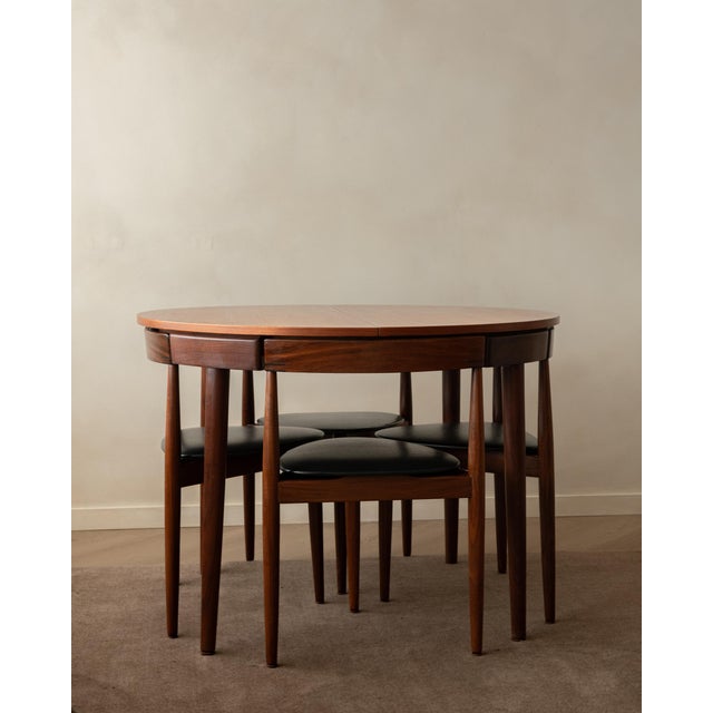 A vintage danish modern teak roundette dining set designed by hans olsen for frem røjle, produced in denmark during the...