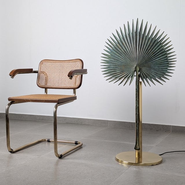 This large sculptural table lamp was produced by Valenti in Spain during the 1970s. The design features a stylized fan...