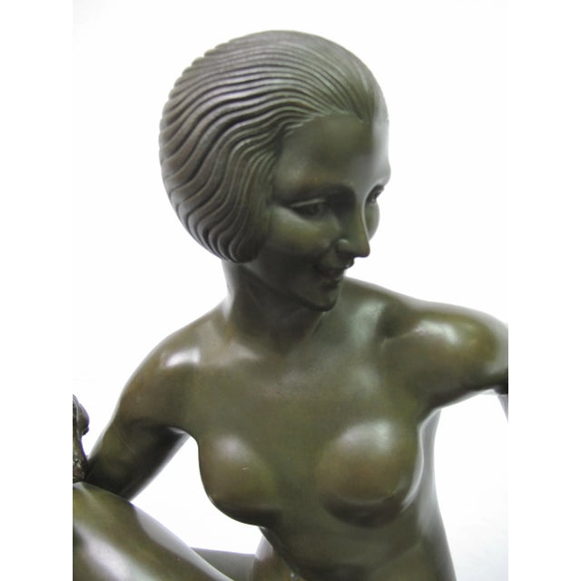 Art Deco bronze sculpture by Maurice Guiraud-Riviere (French, 1881-1947). A scarce untitled work often called woman with...