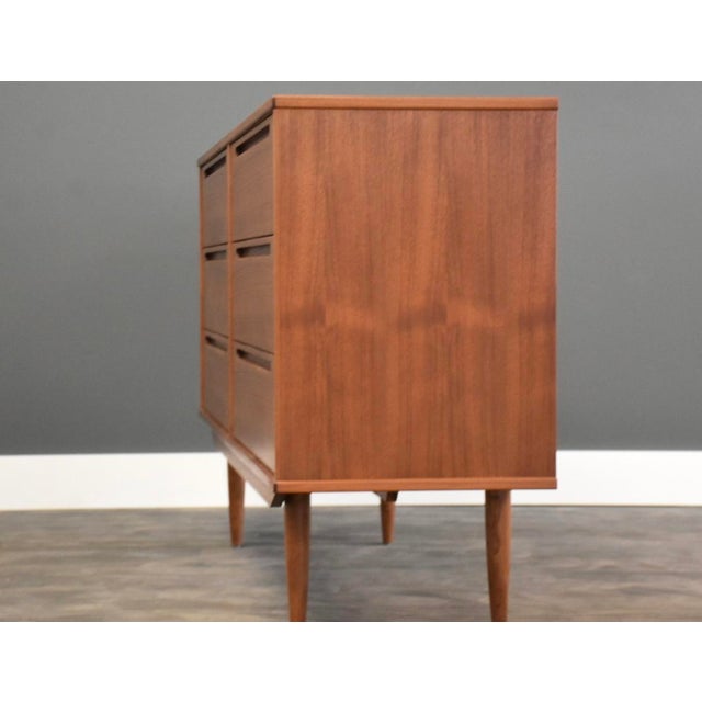 A mid century modern six drawer long dresser by Nils Jonsson. Made in Denmark. Circa 1960’s. Professionally refinished....