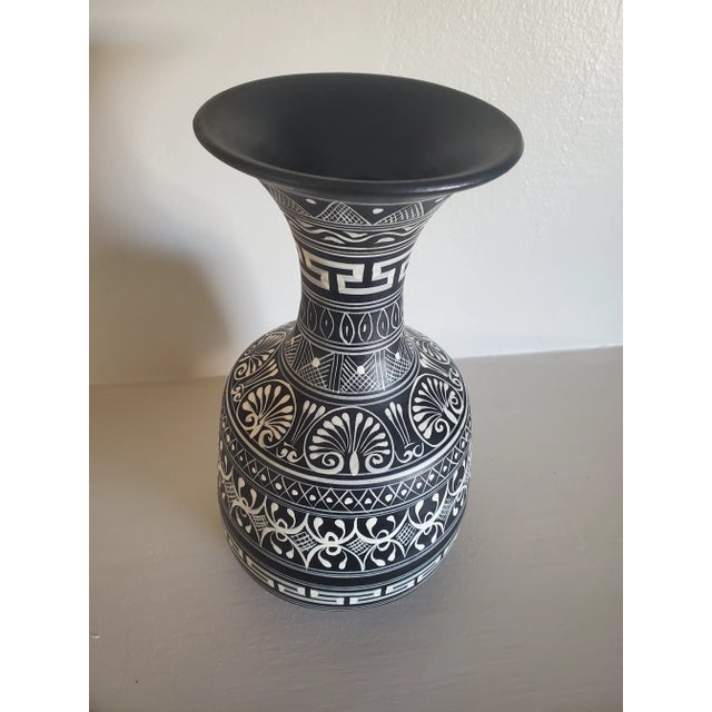 Absolutely gorgeous, unique and graphic handpainted terracotta vase from Mexico circa 1978. Signed on the bottom as...