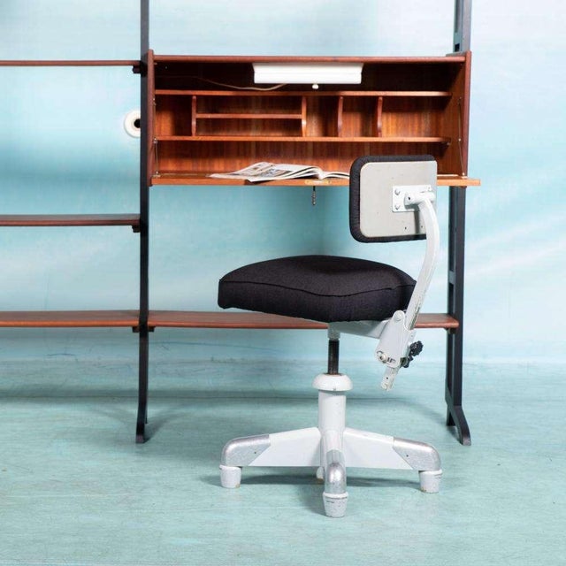 Swiveling and height-adjustable office chair on a four-legged base made of sheet steel with rubber caps (version P). Made...