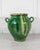 Made in France around 1840, this confit pot is finished in a green glaze with a yellow splash. Confit pots were everyday...