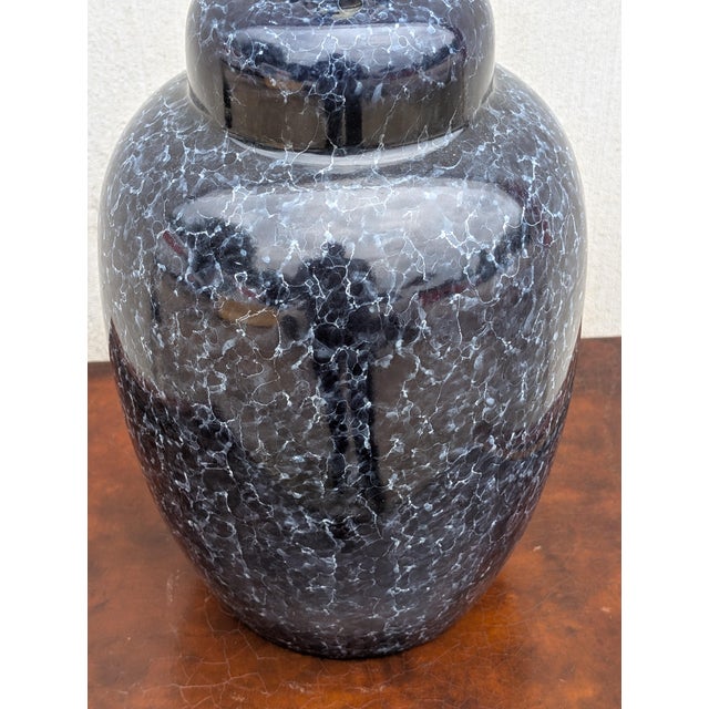 Elevate your interior with this striking vintage dark blue ceramic ginger jar table lamp. Featuring a rich, cobalt-toned...
