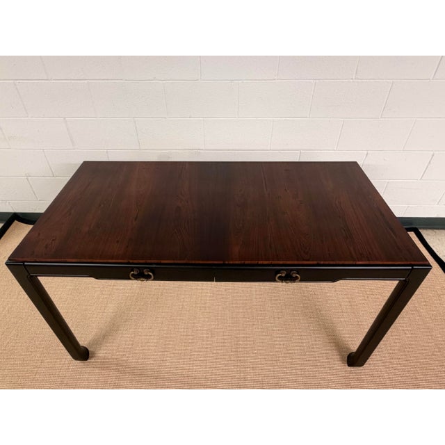 Beautiful Rosewood top Writing desk from Tomlinson. Black Lacquer over a trim silhouette and a chinoiserie leg. Condition...