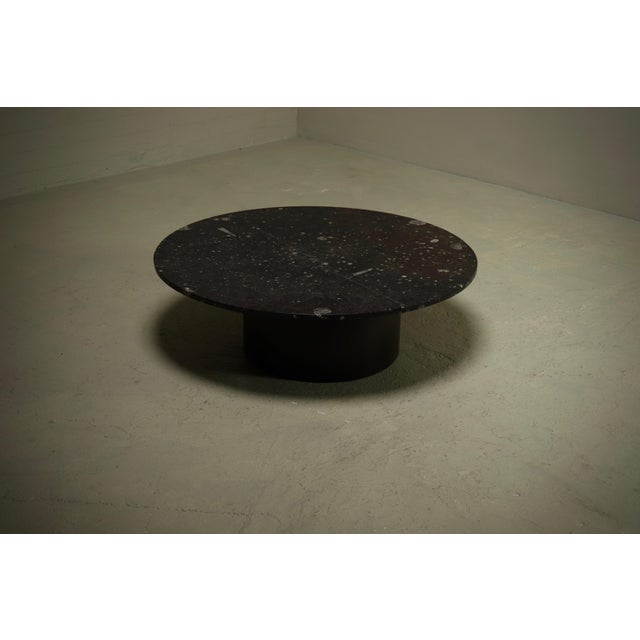 Rare coffee table produced by Metaform in the 1970s. What truly sets this piece apart is its extraordinary circular stone...