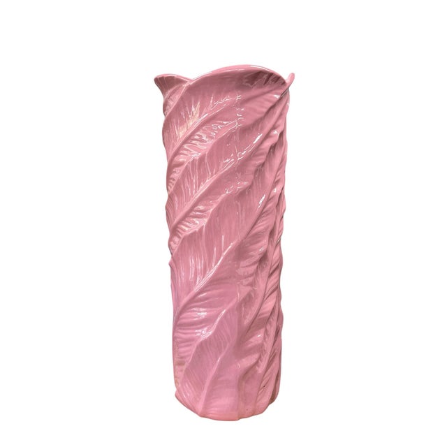 Vintage banana leaf umbrella stand finished in pink. Goes well with but not limited to coastal, grandmillennial, tropical...