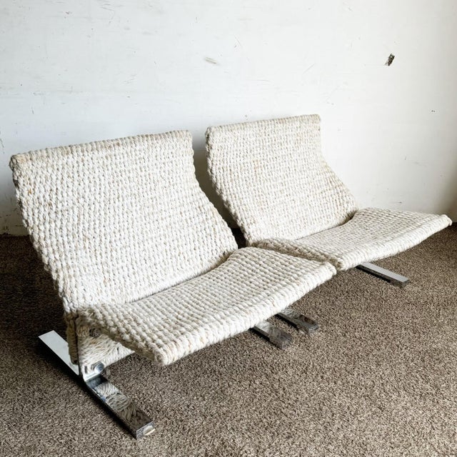 Immerse yourself in mid-century elegance with this pair of Marzio Cecchi low lounge chairs. Featuring a unique combination...