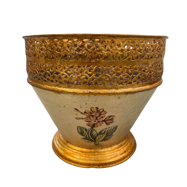 This charming vintage metal cache-pot features a classic tapered silhouette, blending traditional Mediterranean aesthetics...