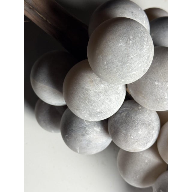 Large alabaster grape cluster. Originating from Italy. Color: Grey. Beautiful as decoration in both modern and classic...