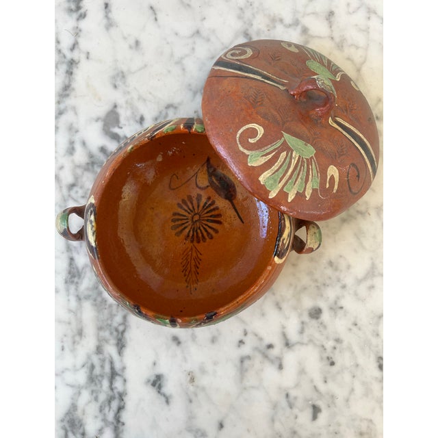 Hand painted handled bowl with lid. Made in Mexico.