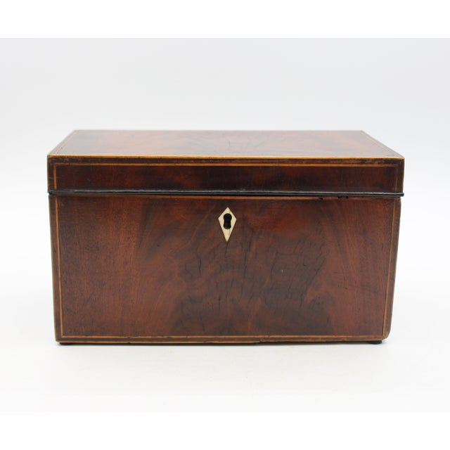 Late 18th century George III period tea caddy box, English. Handsome with flame mahogany veneer & bone diamond escutcheon;...