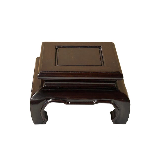 Elevate your prized possessions with this stylish and functional dark brown square wood display stand. Featuring...