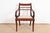 A gorgeous Regency or Empire style dining captain chair, armchair, or side chair Baker Furniture, "Milling Road"...