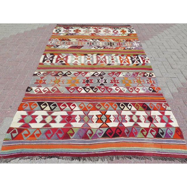 The Rug you are about to purchase is a Vintage Handmade Turkish Rug that is considered a collection piece due to its value...